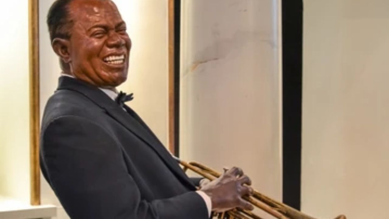 Louis Armstrong with his trumpet. 